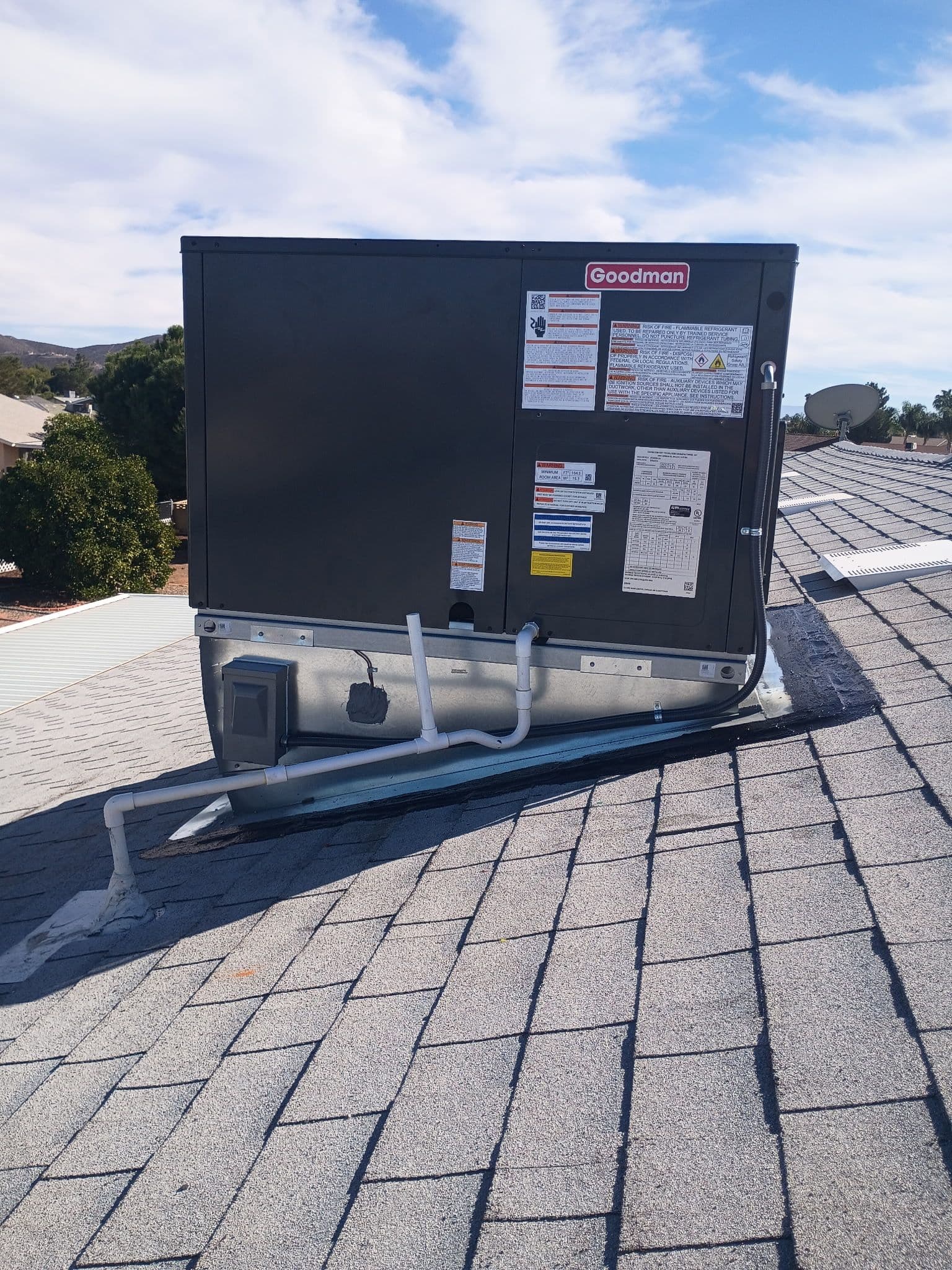 Project Efficient A/C Installation: Goodman Unit on a Rooftop image