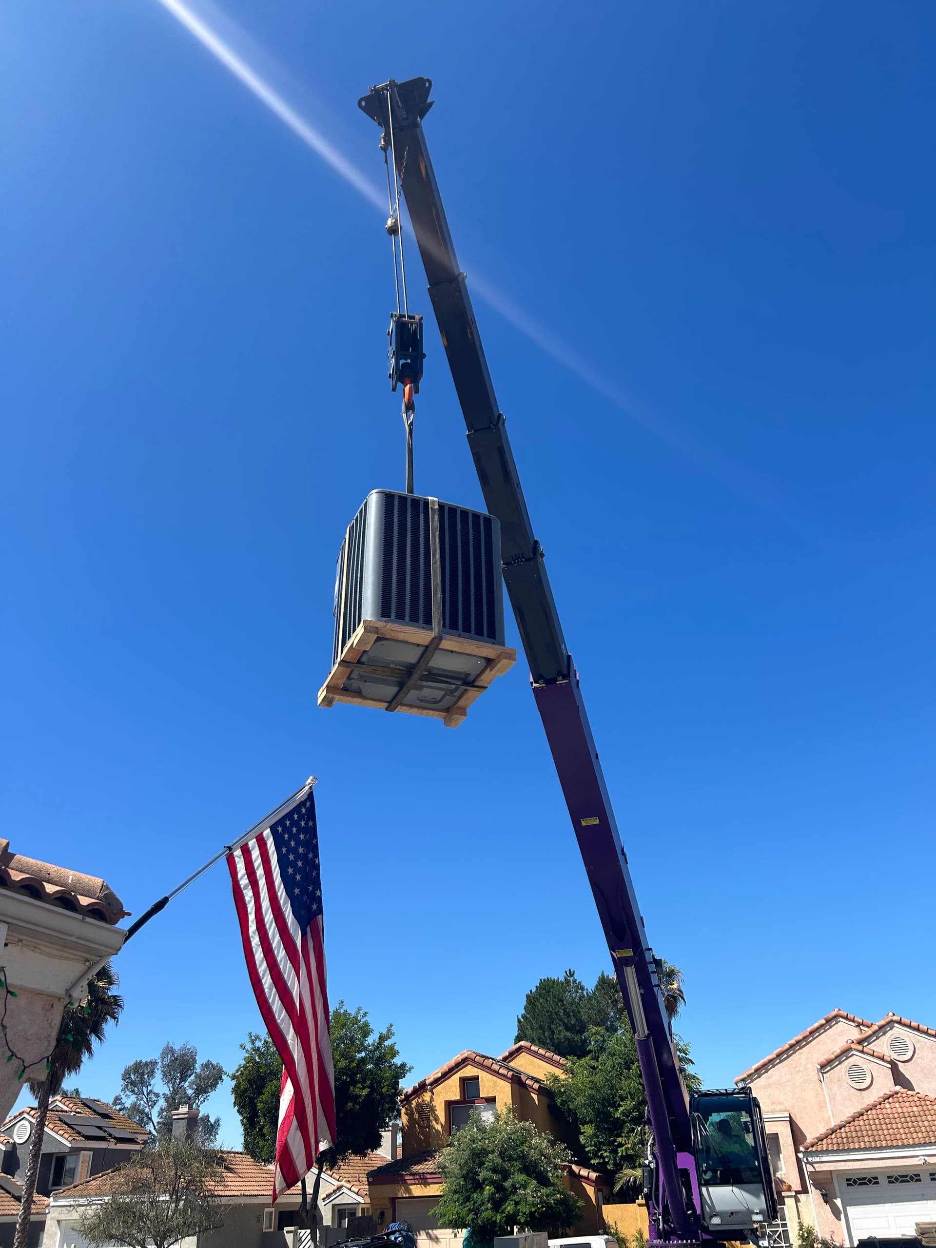 Crane-Assisted A/C Replacement When There's No Easy Way In image